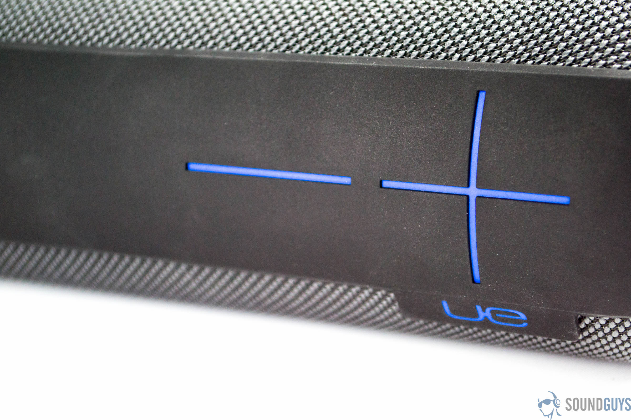 A picture of the UE Megaboom 3 Bluetooth speaker button controls, plus and minus.