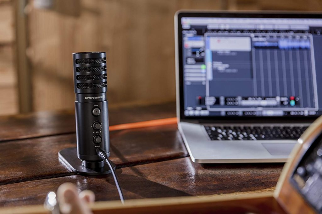 Best USB microphones: A product image from amazon of the microphone sitting on a desk with a laptop open.