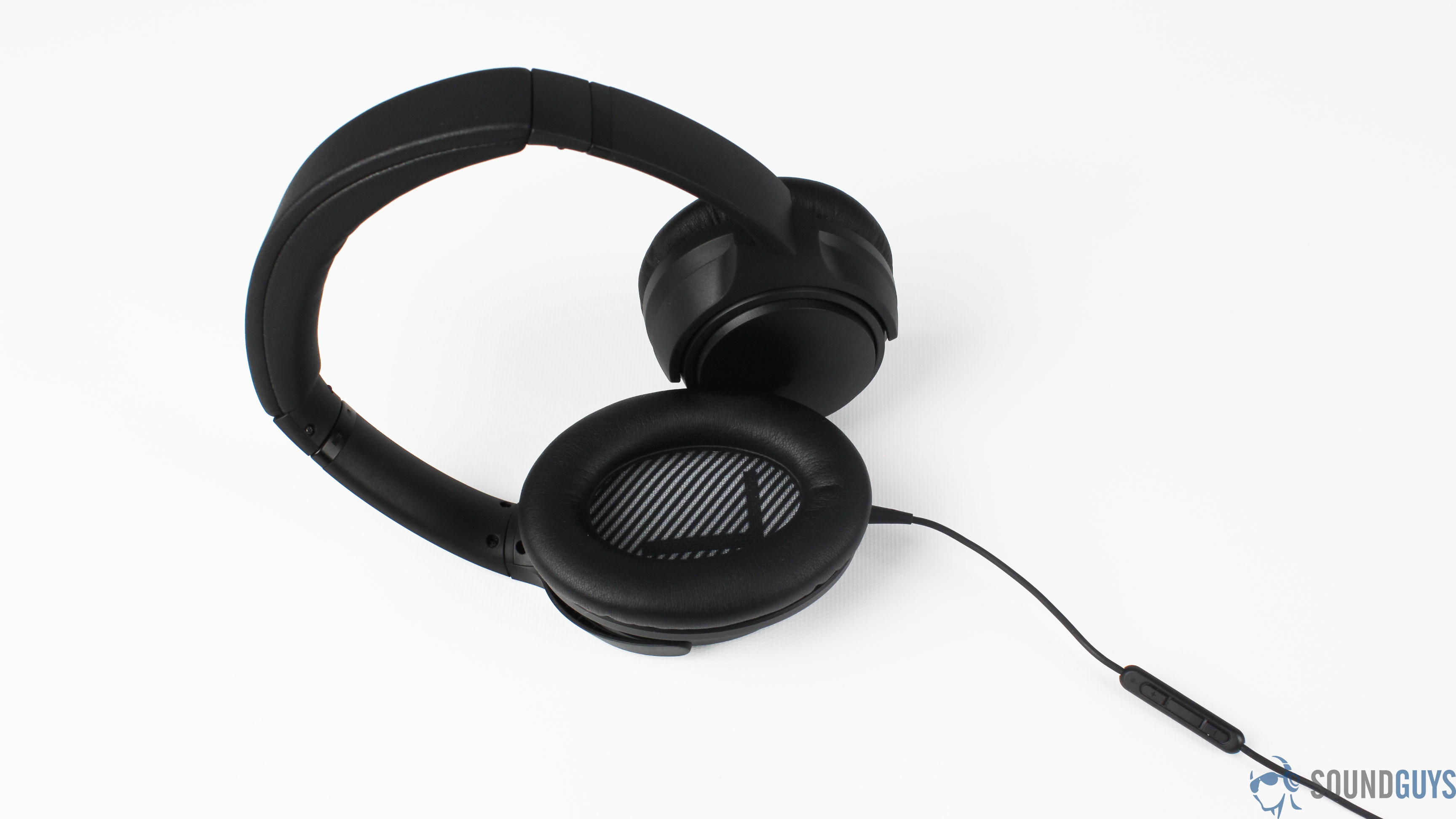 Best headphones under $100: The headphones on a white surface with the inner left ear cup showing.