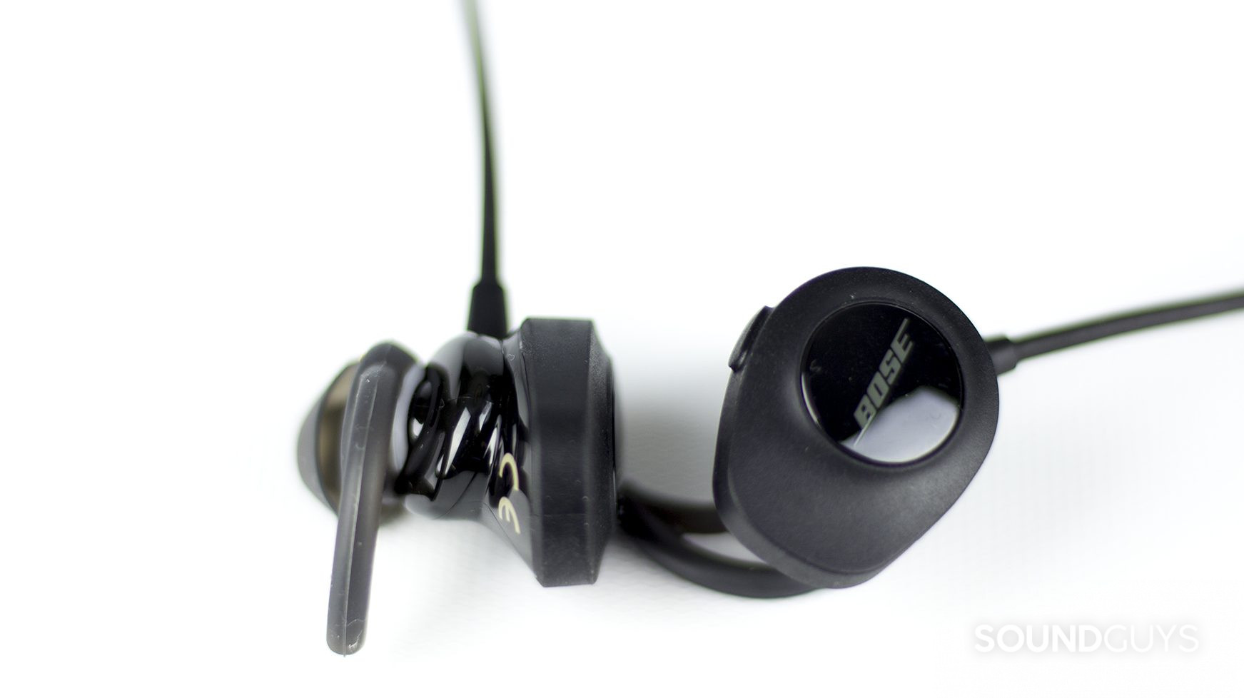 The Bose SoundSport Wireless earbuds in black with the buds and tips in view.