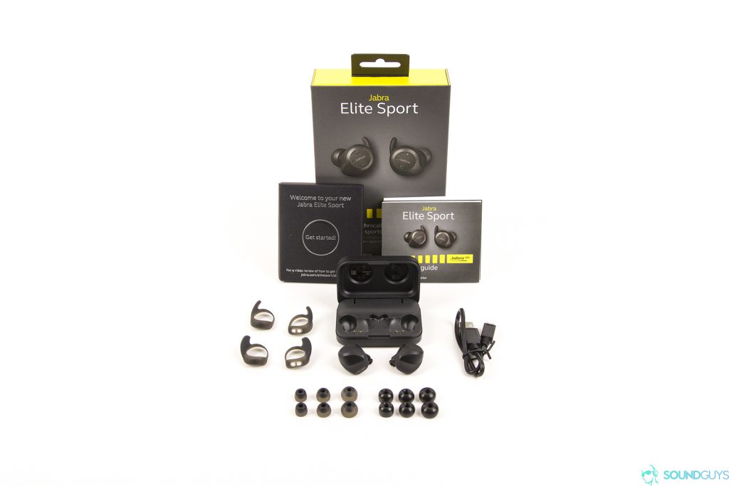 Pictured are the contents of the Jabra Elite Sport packaging with all of the accessories on a white background.
