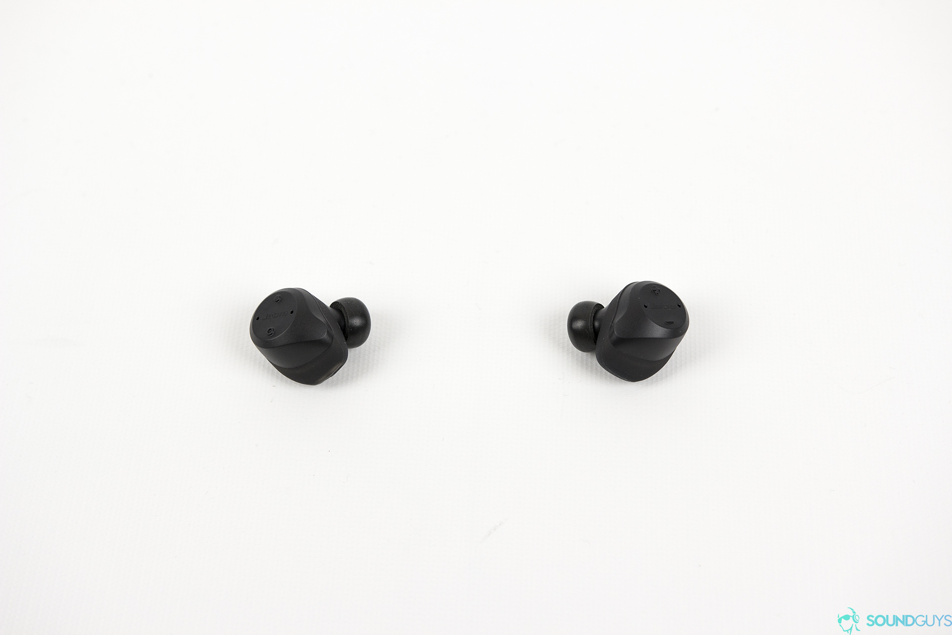 The Jabra Elite Sport Wireless earbuds are as minimal as it gets. Their all black look makes it easy to keep a covert look while listening. Pictured: The earbuds on a completely white background.