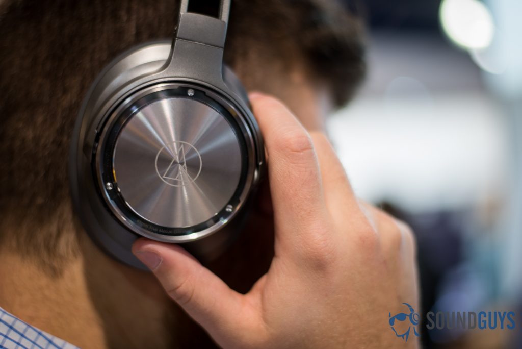 A man wearing Audio-Technica headphones at CES.