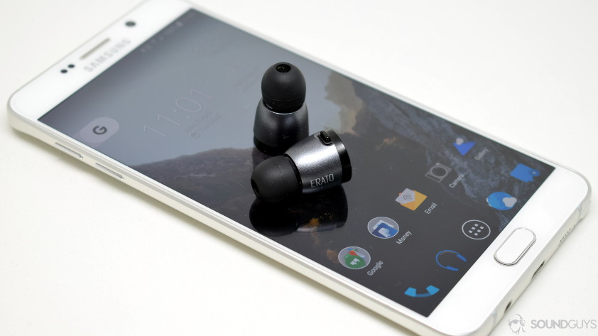 A photo of the Erato Apollo 7 truly wireless earbuds on a smartphone.