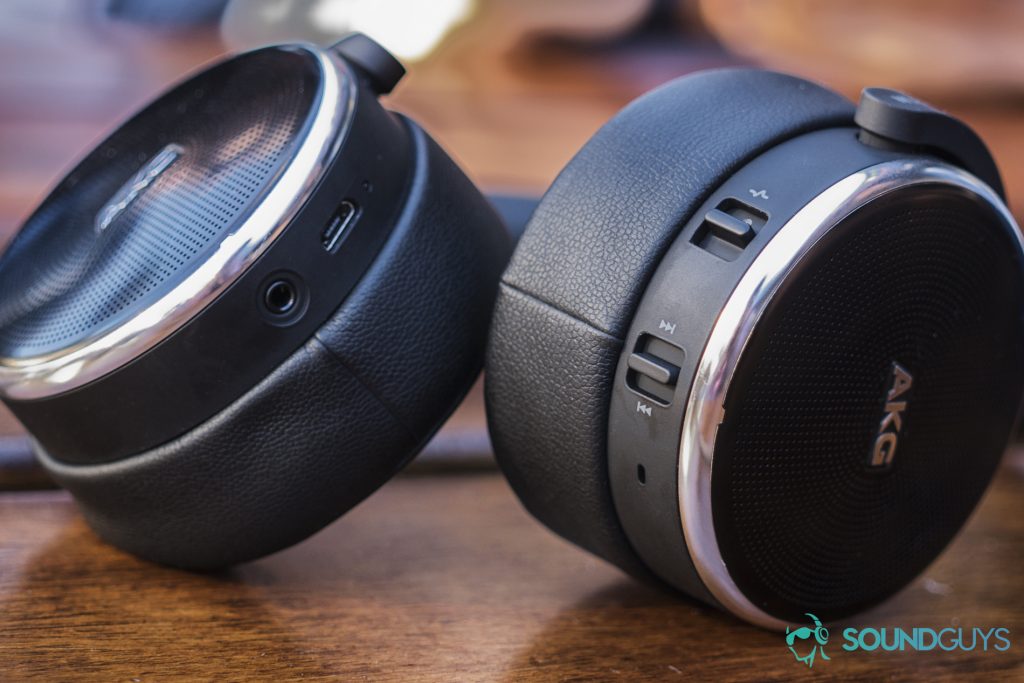 The AKG N60NC headphones on a wooden table.