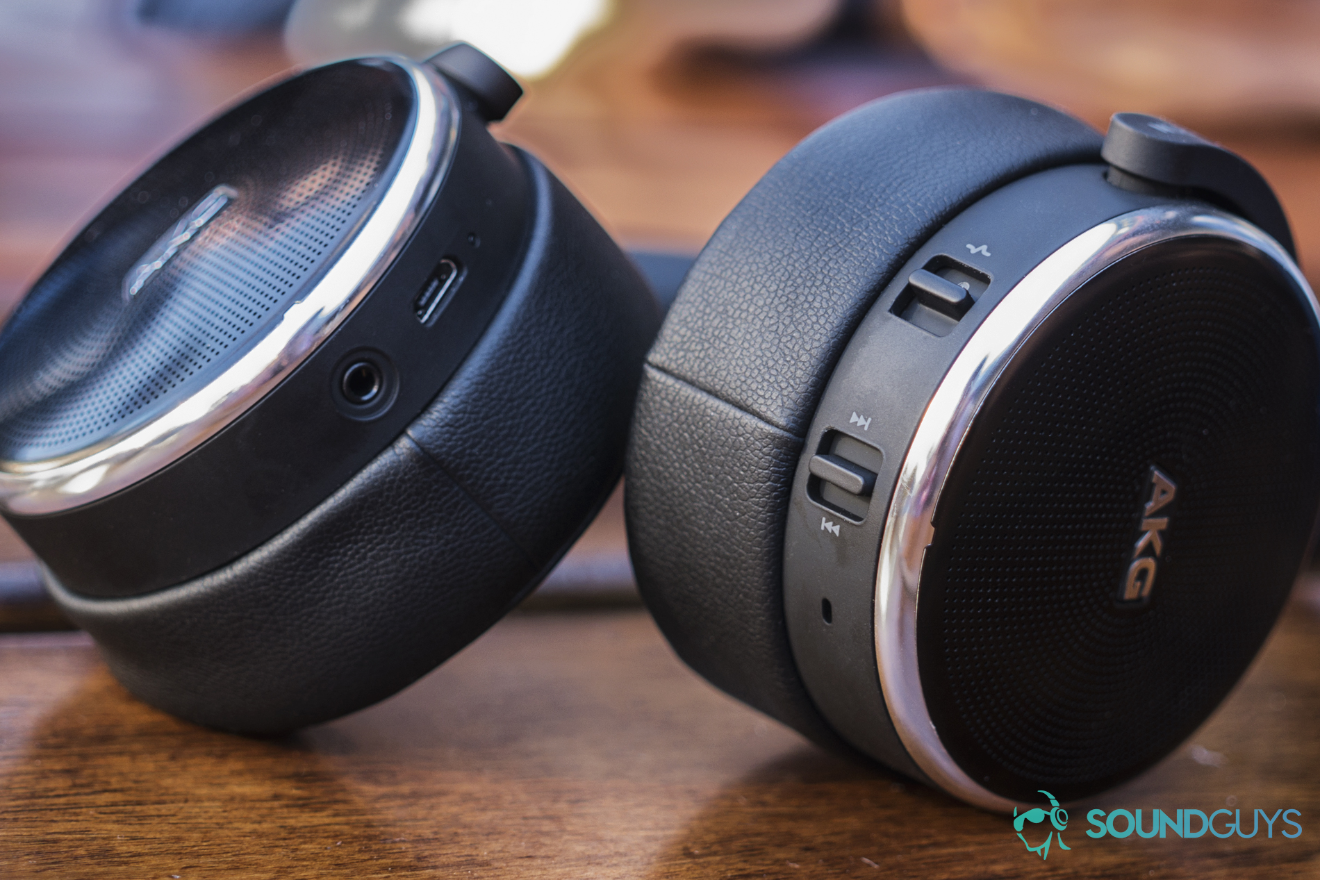 akg-n-60-nc-review-track The AKG N60NC headphones on a wooden table.