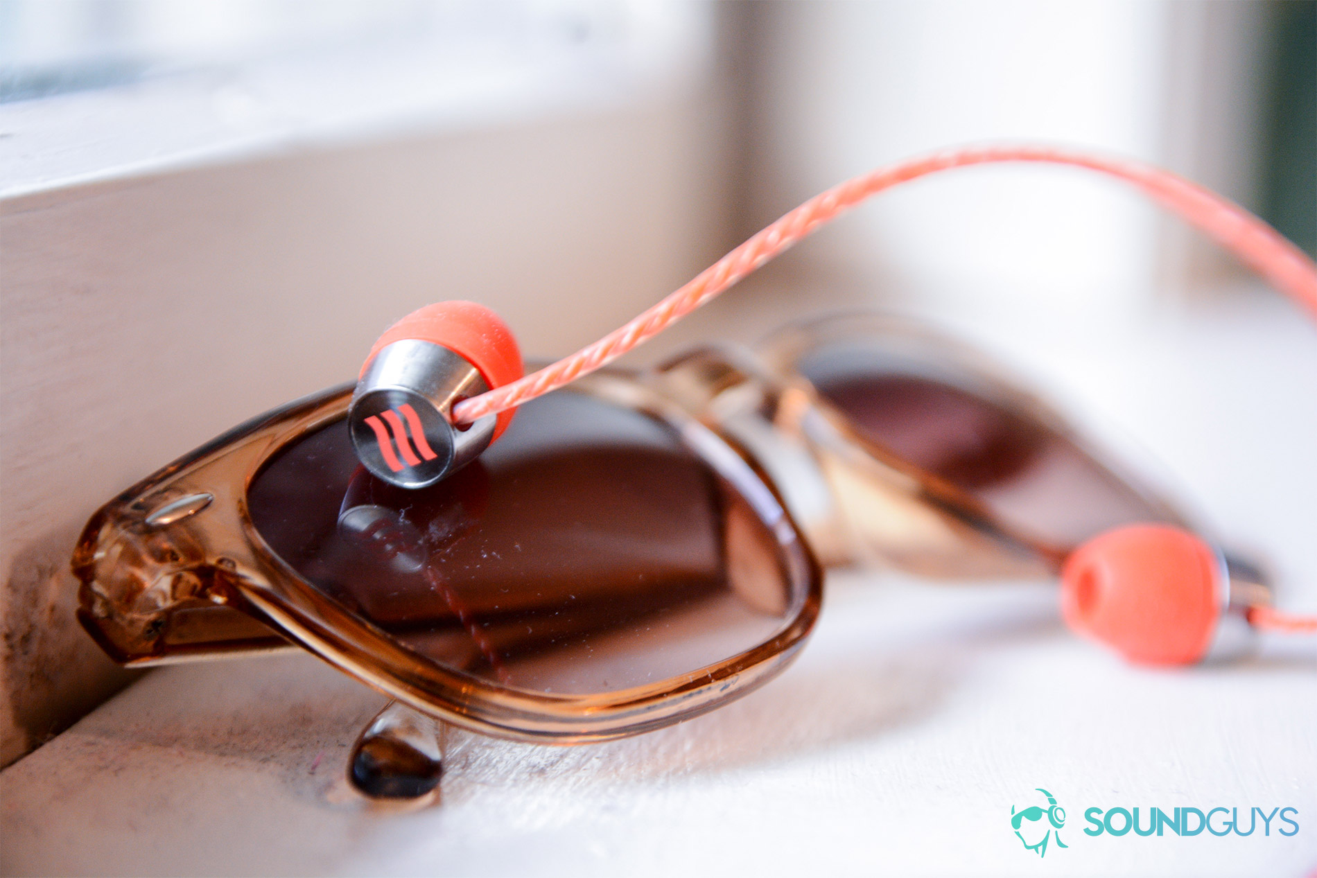 Traveler05 A photo of the Echobox Traveler resting on sunglasses.