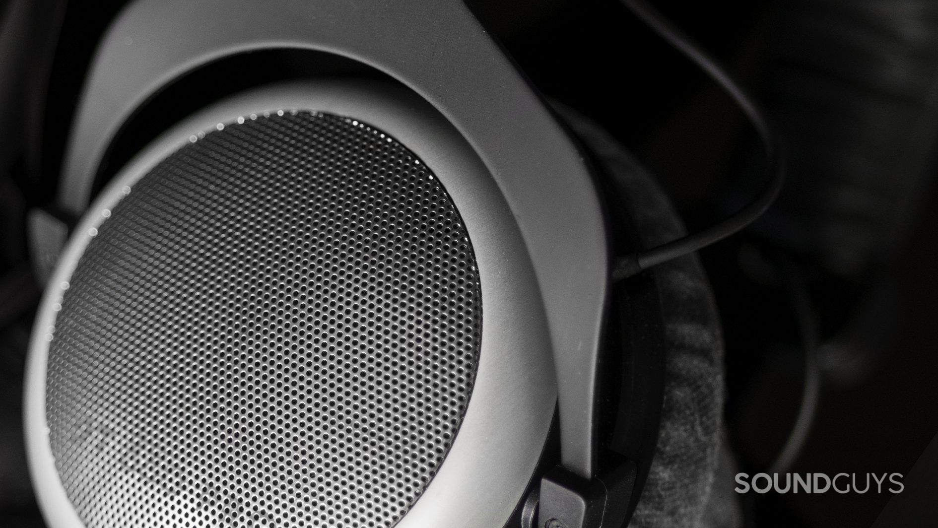 The Beyerdynamic DT 880 PRO open-back headphone grille with the velour ear pads in frame.