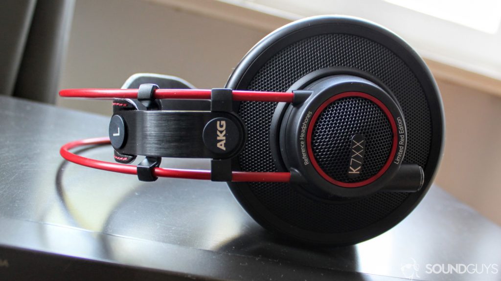 A photo of the AKG K7XX lying sideways on a desk with the logos clearly visible. 