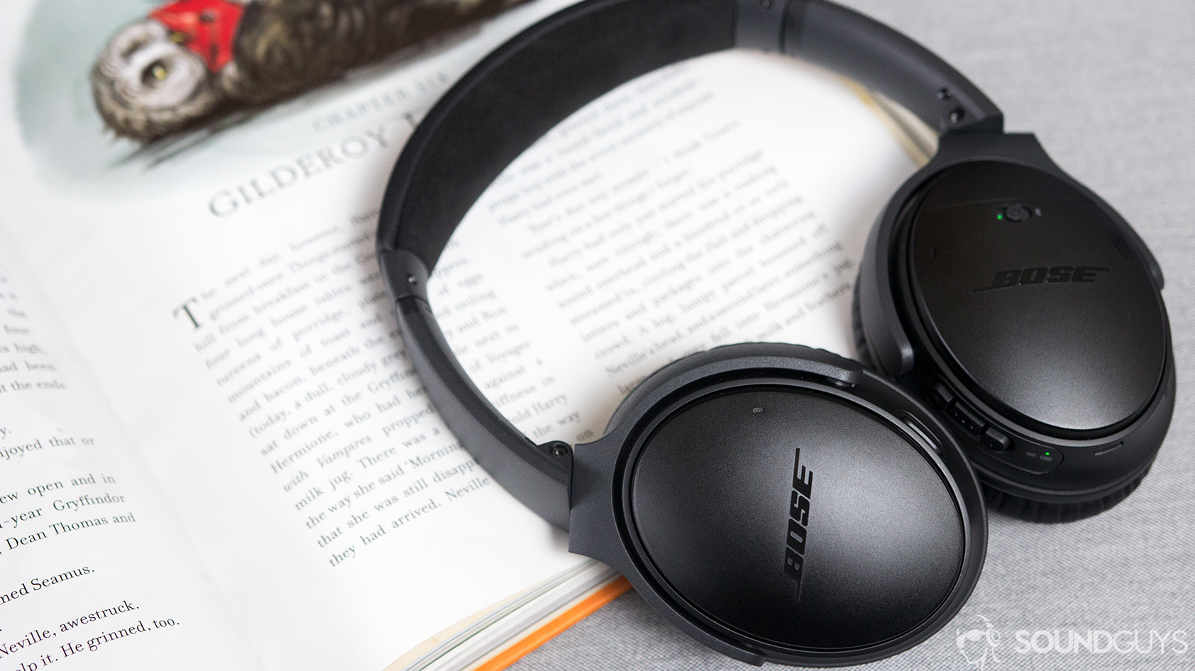 The Bose QuietComfort 35 II lying on an open book.