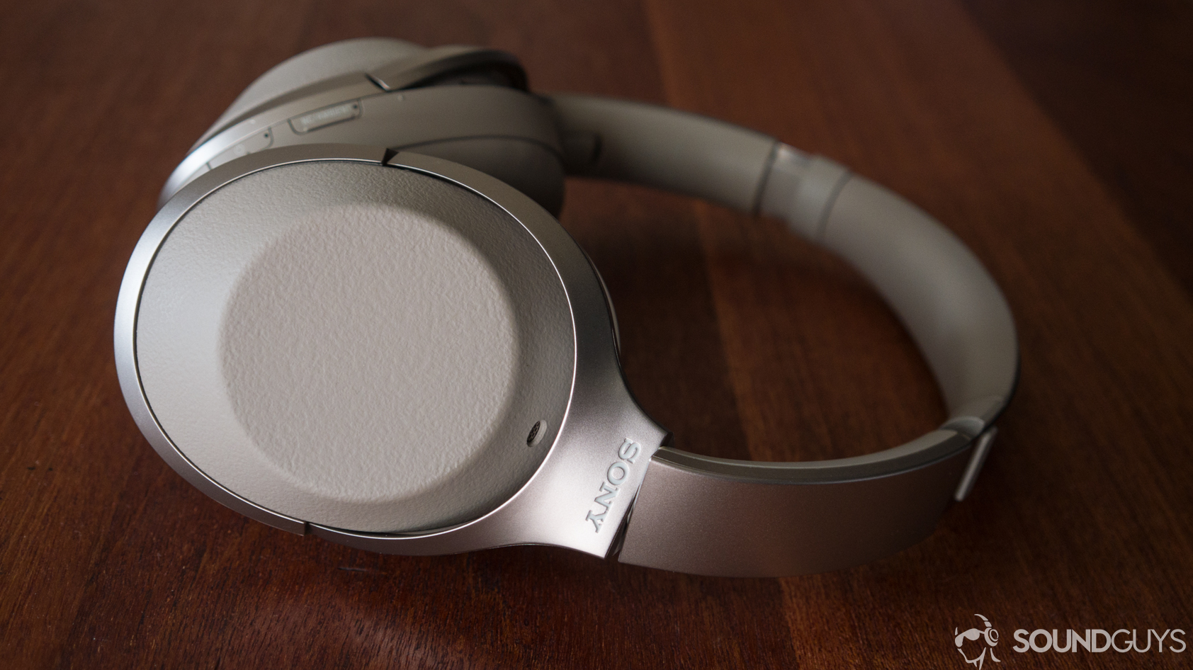 A photo of the Sony WH-1000X M2 wireless Bluetooth headphones on a table.