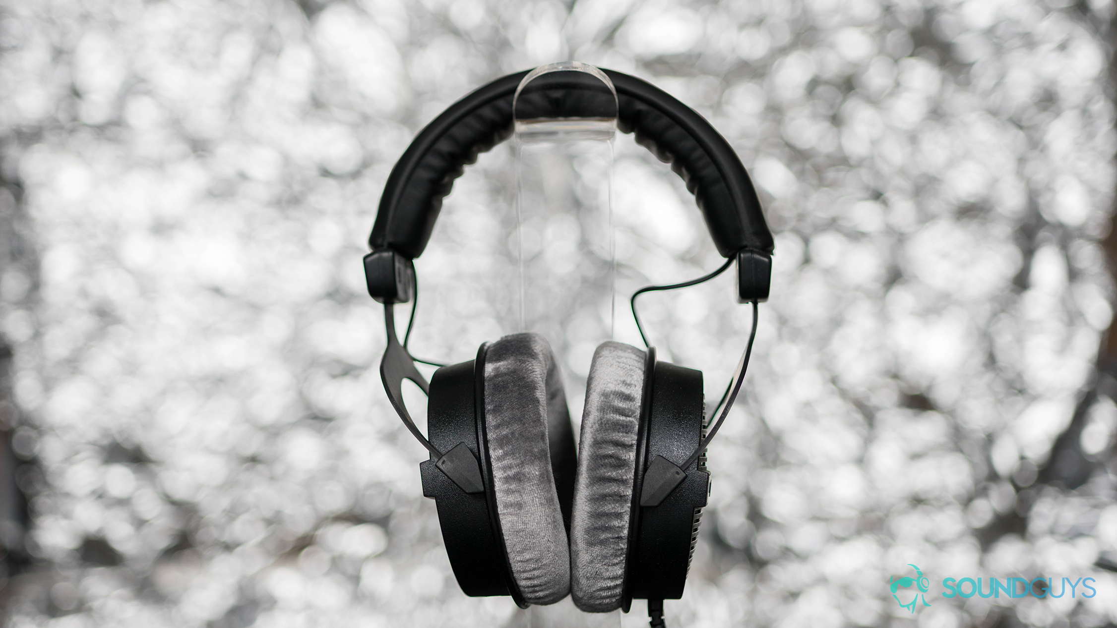 Best headphones under $200:A photo of the Beyerdynamic DT 990 PRO on a headphone stand