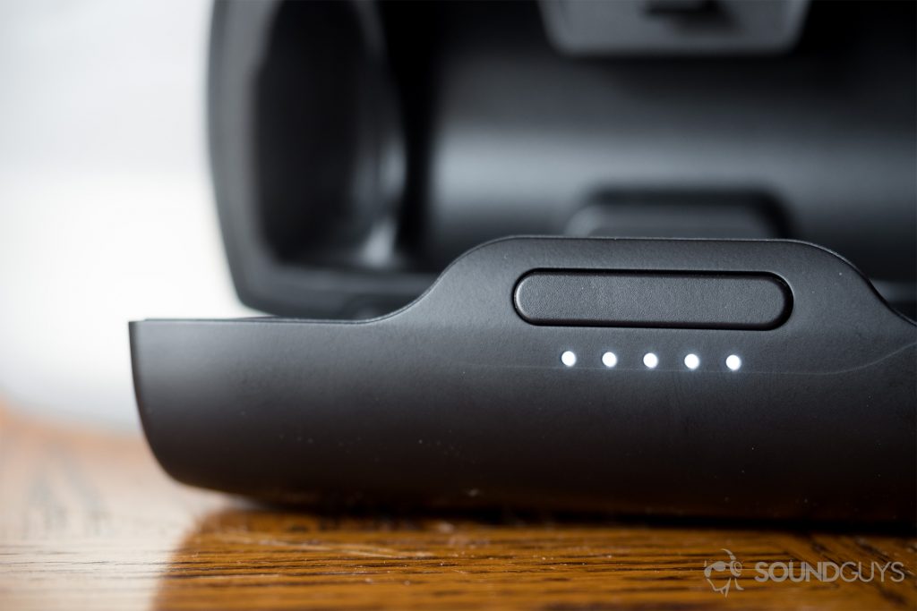 The charging case is equipped with five LED indicators to quickly show the percentage of battery life remaining in the case. Pictured: The Bose SoundSport Free charging case, open, with the LED indicators all lit up.