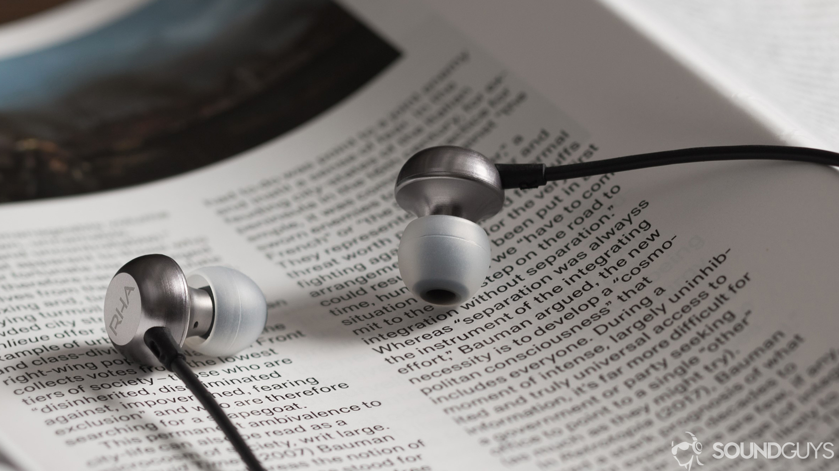 SG-RHA-MA650-news-hero A photo of the RHA MA650 earbuds for Android on a book.