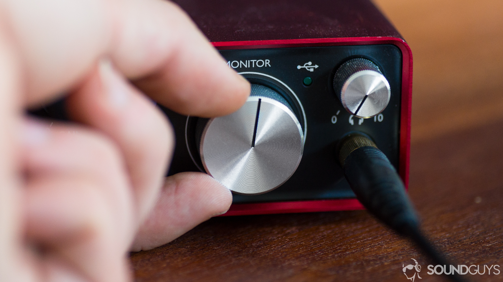 A photo of the Beyerdynamic DT 770 Studio 80 Ohm in use with a Scarlett 2i2 interface.