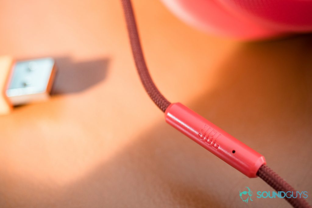 The included 3.5mm removable cable is wrapped in the clothe material as the headband. The one-button remote grants basic playback/call controls but doesn't let users access virtual assistants.