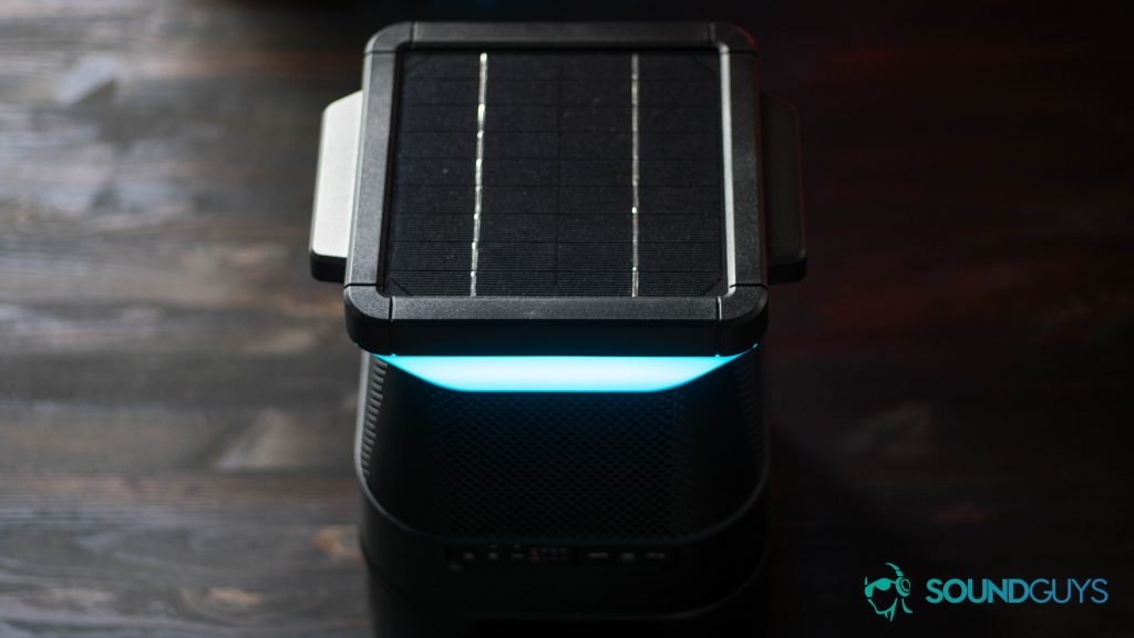 Best Bluetooth speakers under $100: A top-down view of the Monster Solara in black with the blue LED lit up.