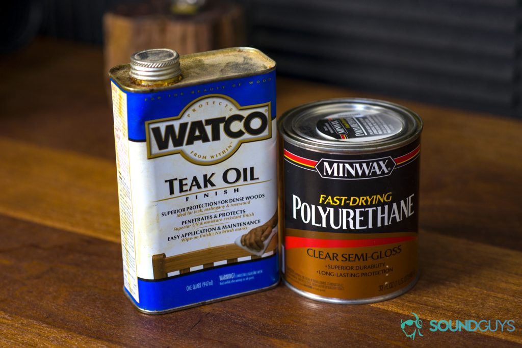 A photo of teak oil and polyurethane side-by-side on a mahogany table.