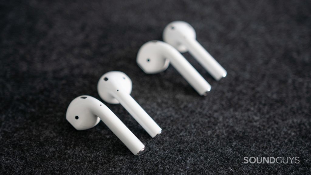 Pictured are the old and new Apple AirPods (2019) next to each other.