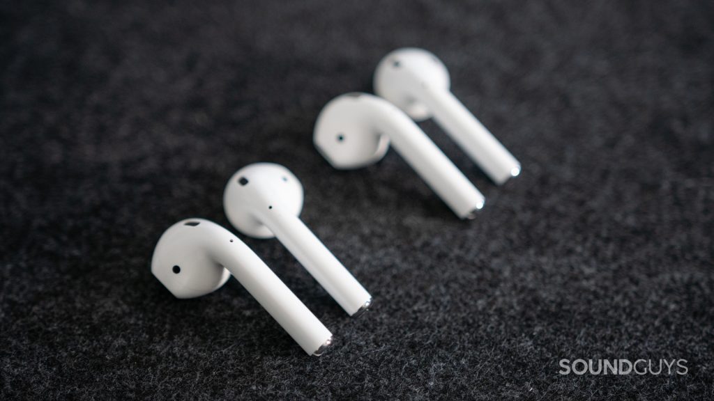 The old and new Apple AirPods (2019) next to each other.