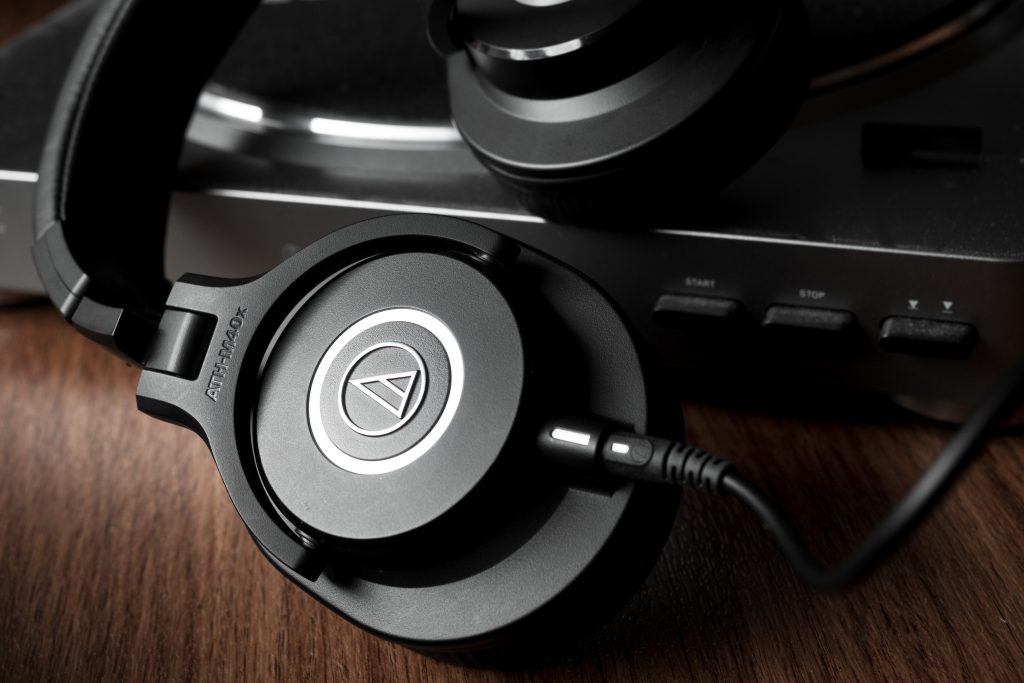 Best headphones under $100: Audio-Technica ATH-M40x on Audio-Technica record player
