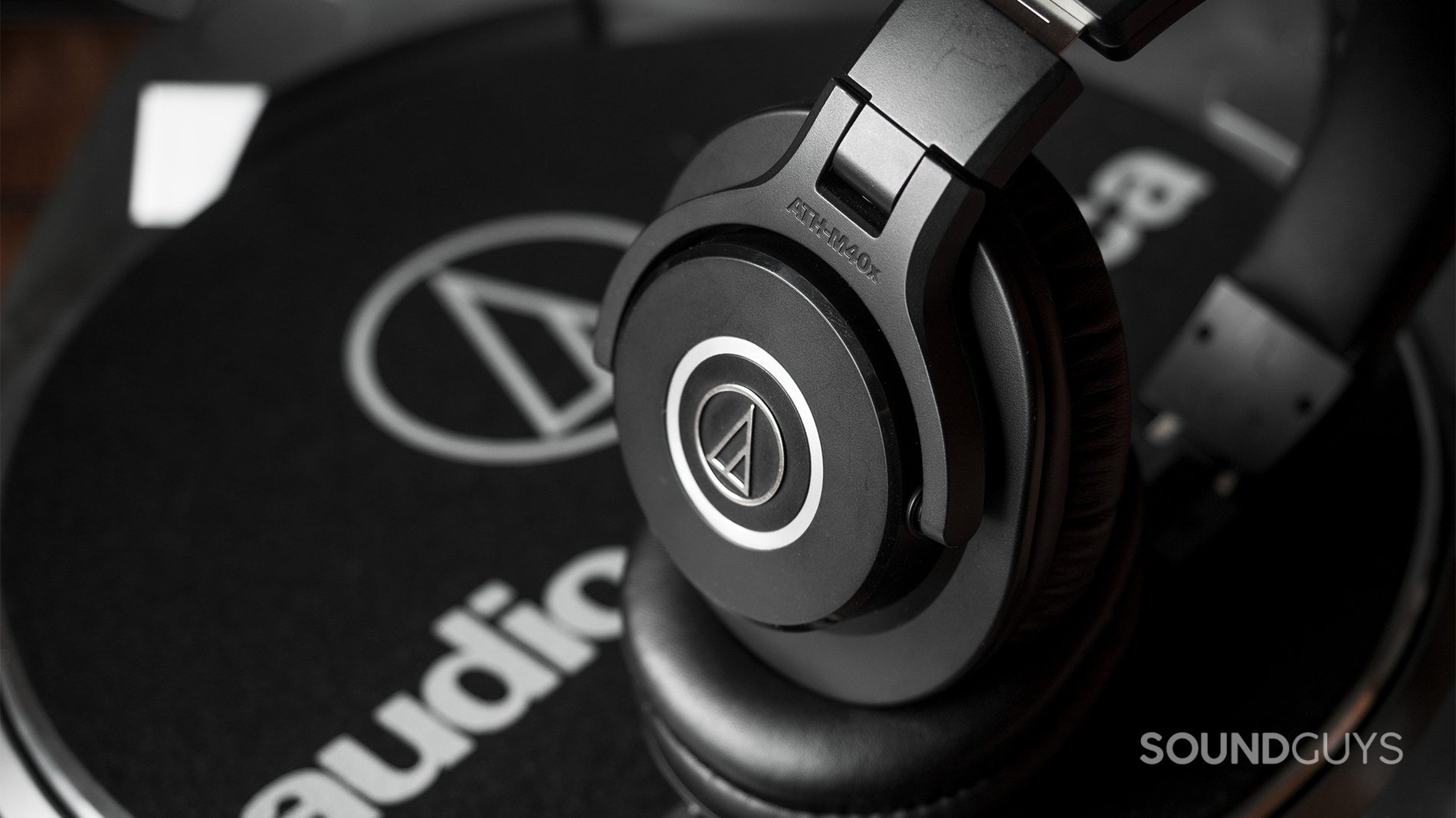 The Audio-Technica ATH-M40x studio headphone on an Audio-Technica record player.