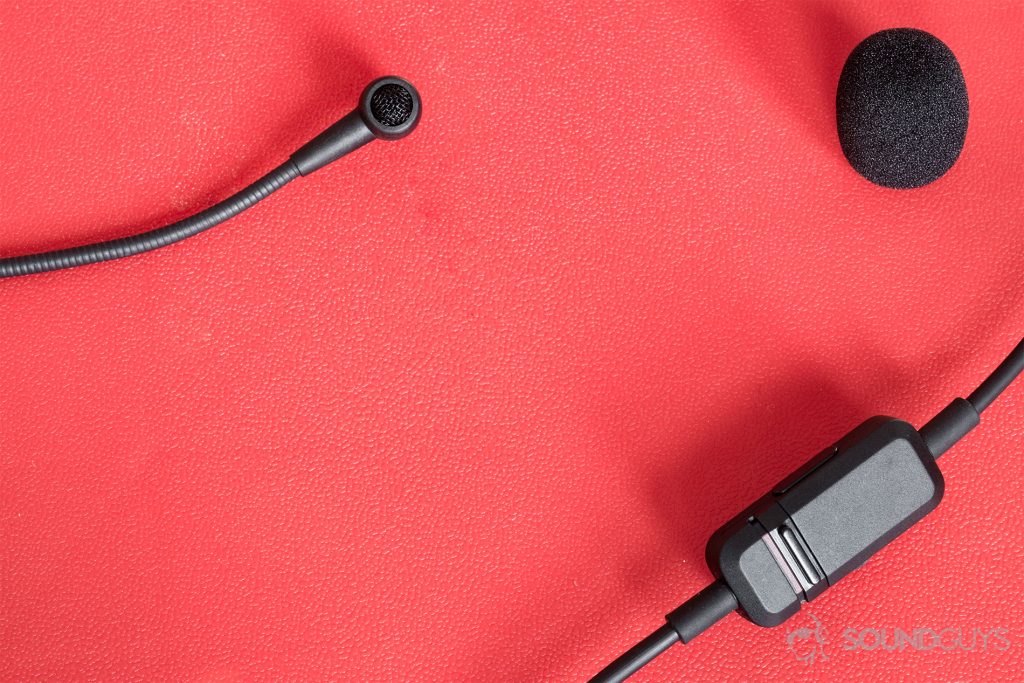 Best USB microphones: The cardioid mic, in-line remote, and pop-shield are pictured on a red background.
