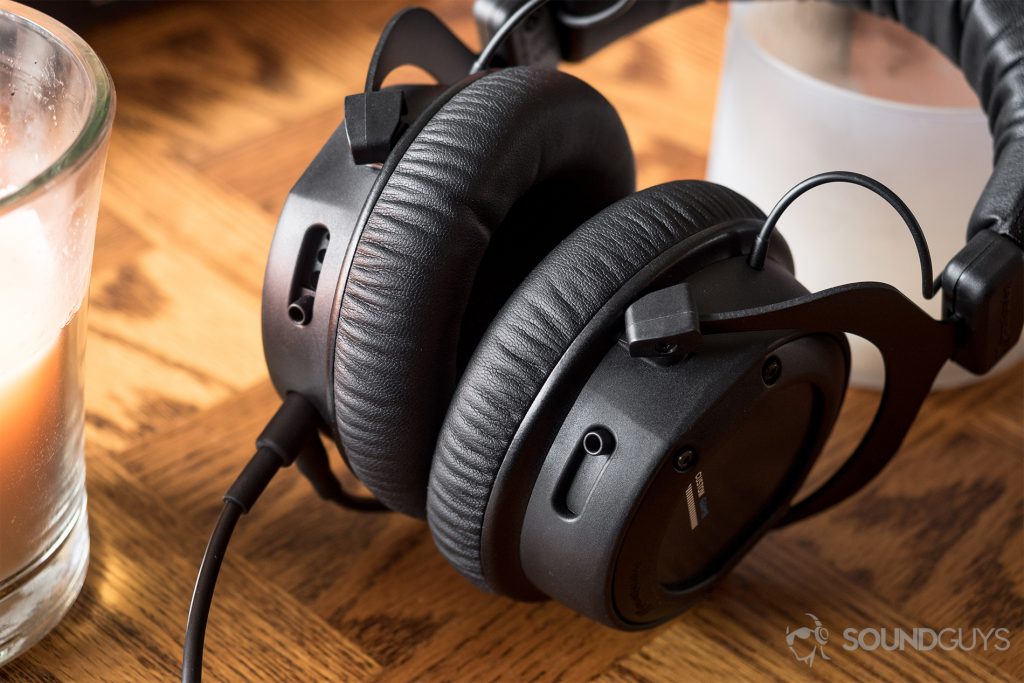 Beyerdynamic CUSTOM Game: The headset is rear-facing to reveal the relfex bass ports, showing that they can remain at different settings to account for hearing variabilities.