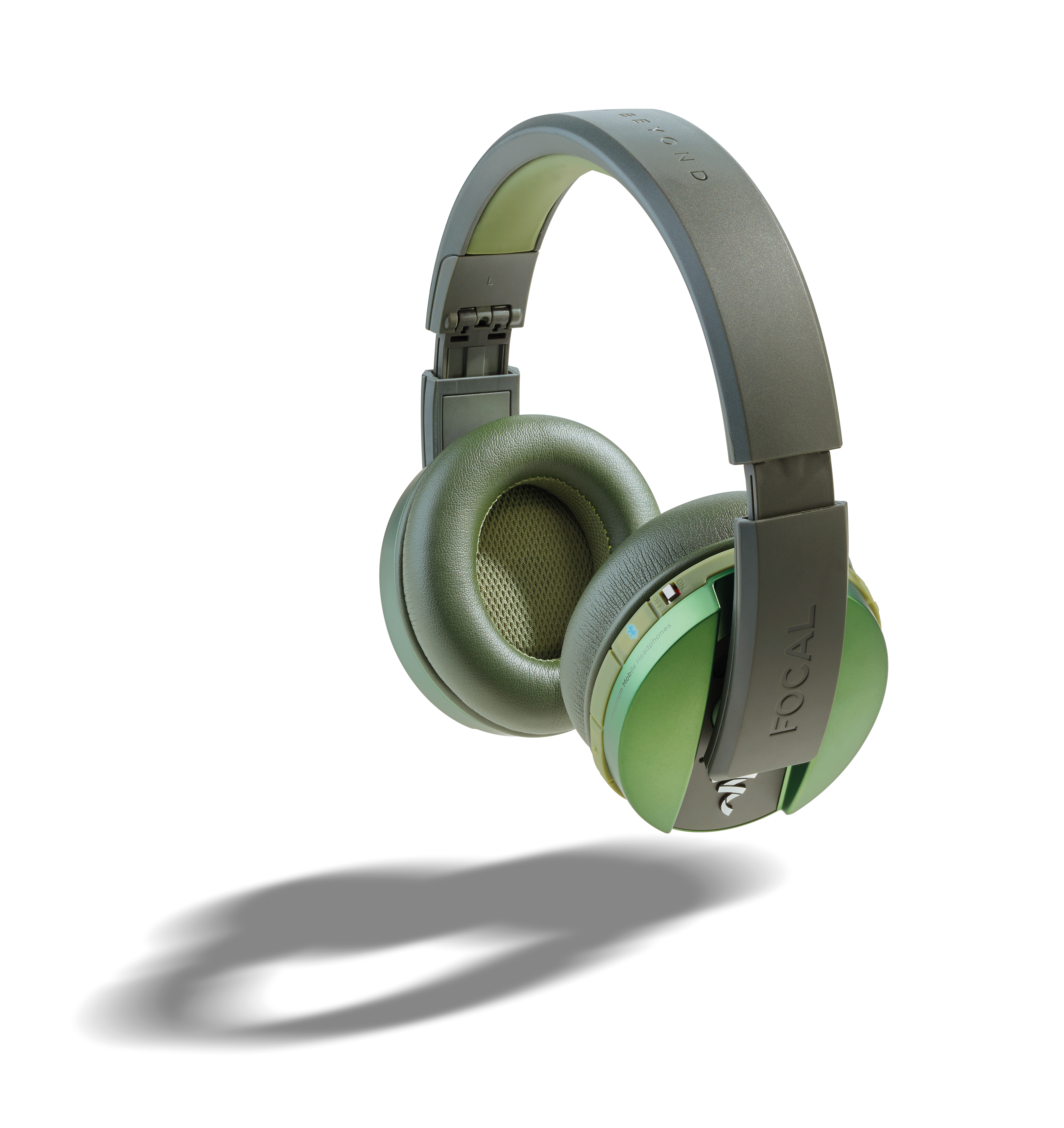 An angled shot of the Listen Wireless Chic, closed-back heapdhones in olive on a white background.