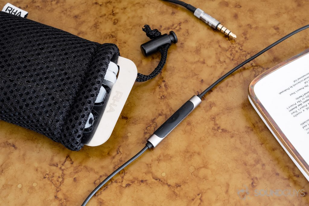 The drawstring, mesh carrying pouch is lightweight and can hold the ear tip carrier and RHA MA650 earbuds. Pictured: An overhead shot of the included accessories of the MA650.