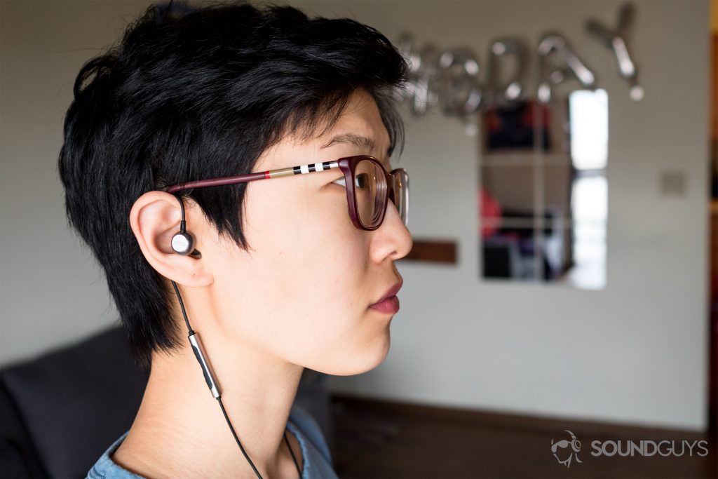 Thinksound ts03+mic: To reduce microphonics, wear the RHA MA650 around the ear. Pictured: The earbuds wrapped around the ear like a hook to reduce reverberations from echoing up the cable and into the ear canal.