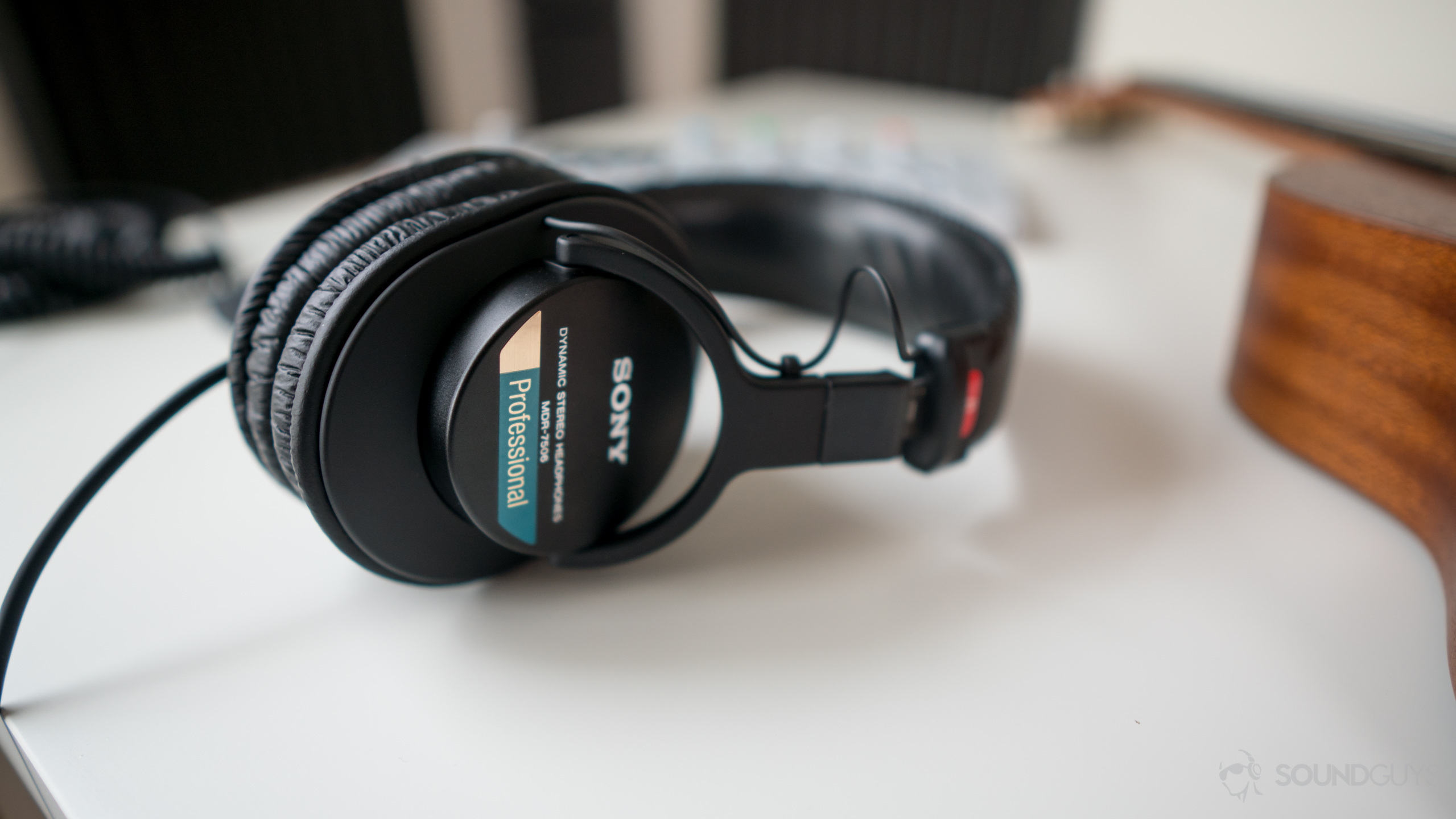 The MDR-7506 headphones lying on a table