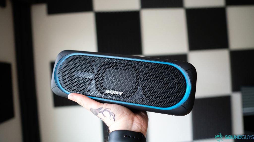 Sony SRS-XB40 Bluetooth speakers being held.