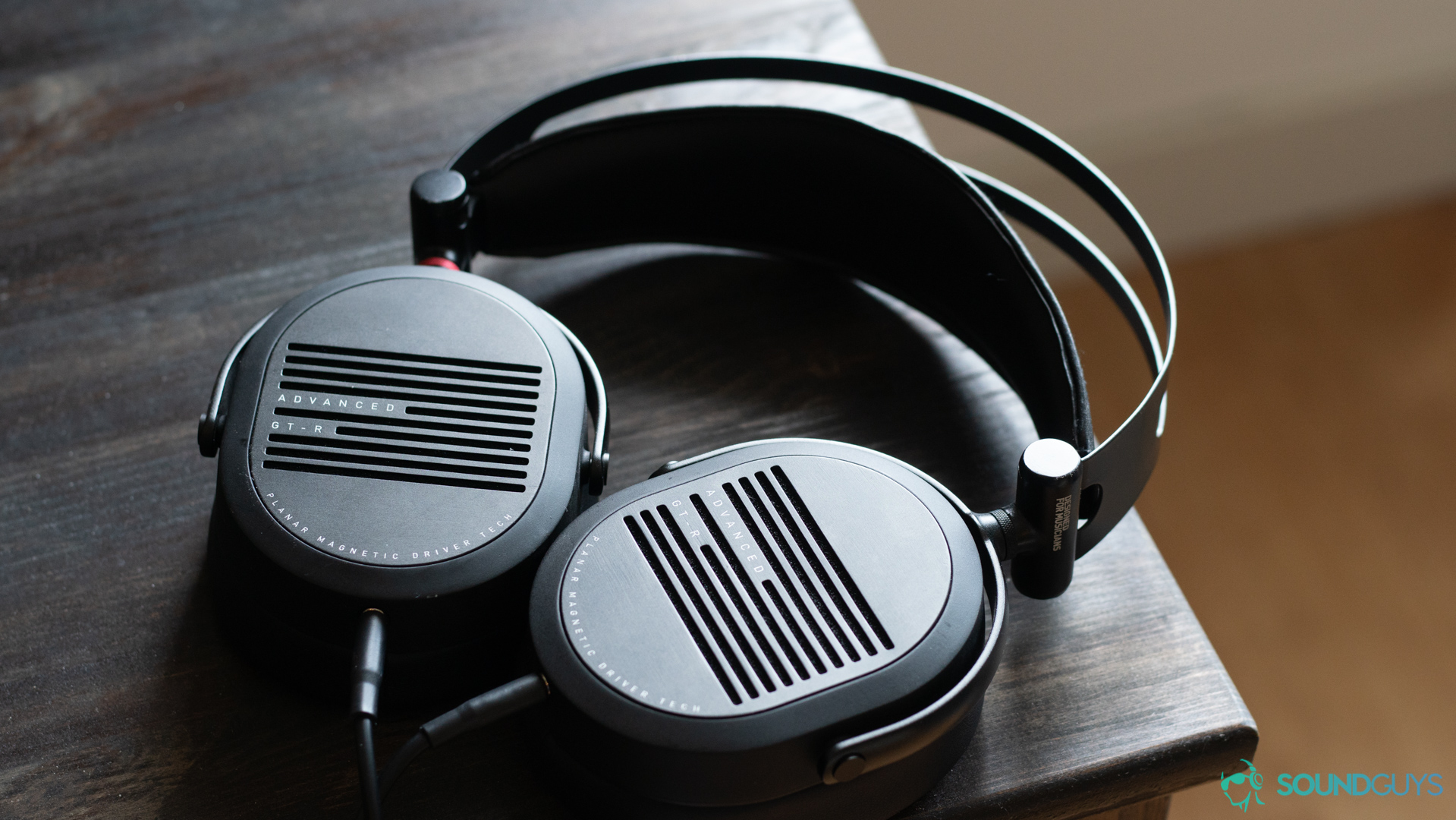 ADV.Sound GT-R-6 The GT-R headphones rotated 90-degrees on a table.