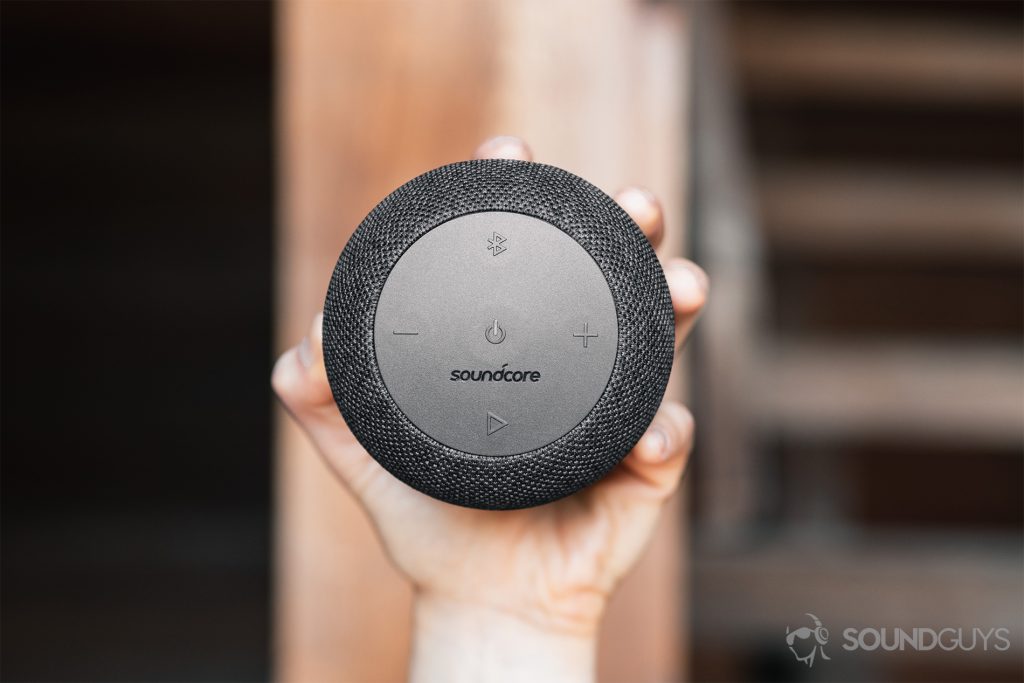 Anker Soundcore Motion Q review: A straight-on shot of the speaker being gripped in the hand.
