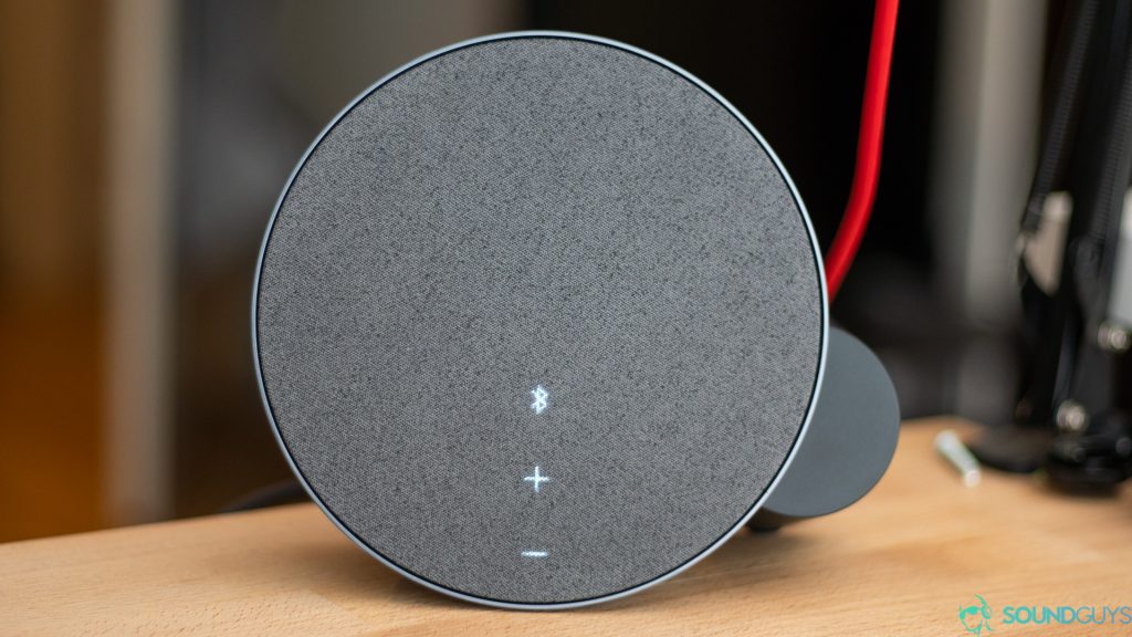 The touch sensitive controls light up behind the fabric of the speaker.