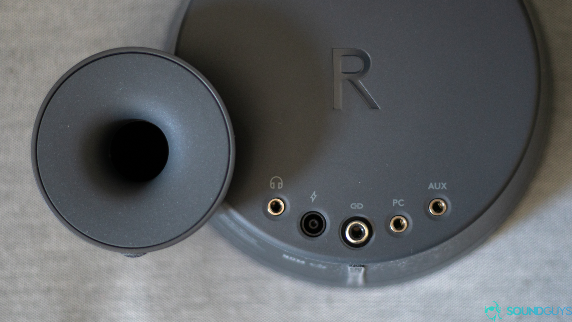 The right speaker has all of the 3.5mm inputs and a headphone jack on the back. 