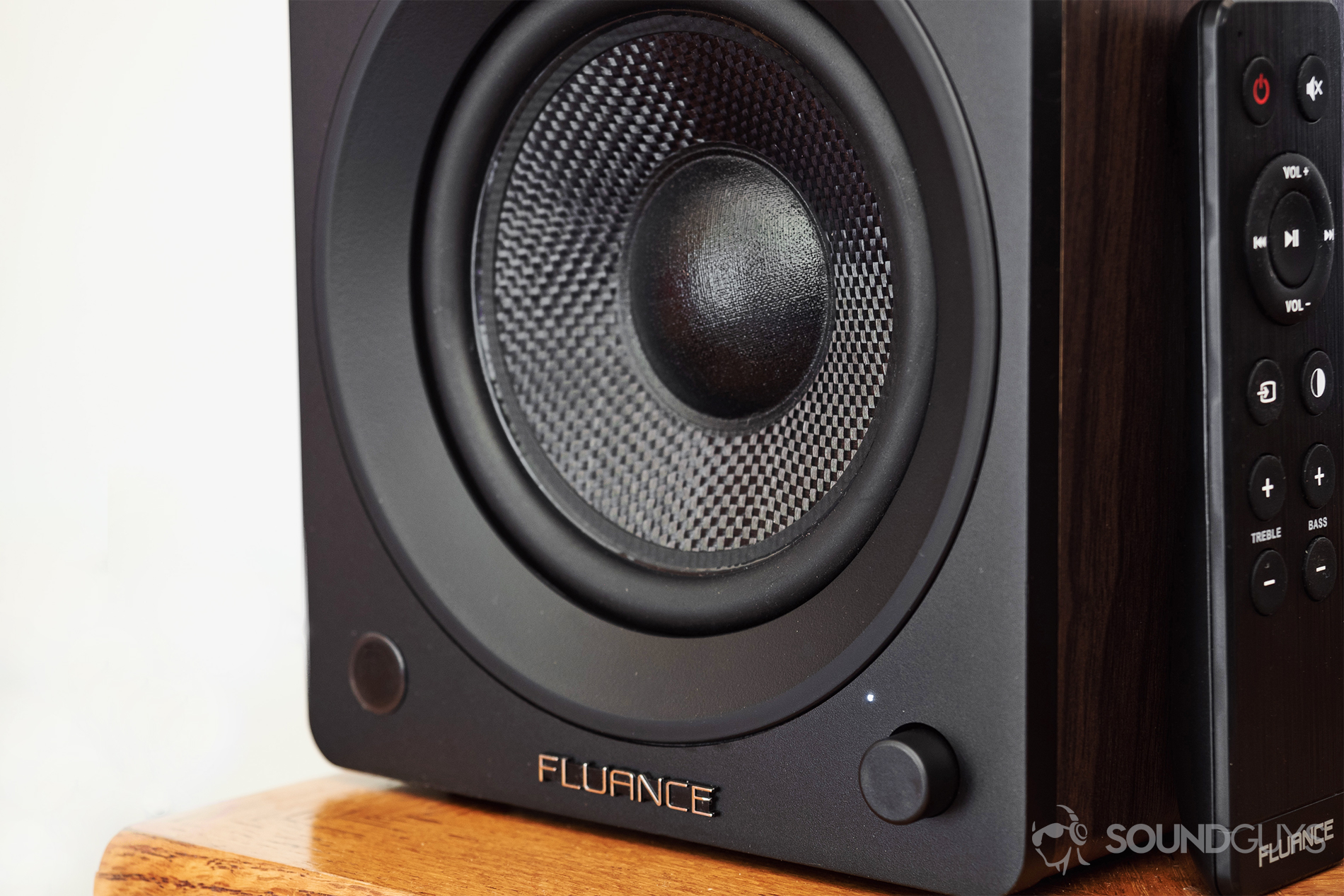 Fluance Ai40 review: An image of the bottom half of the active speaker, which houses the IR receiver, LED indicator, and volume knob.