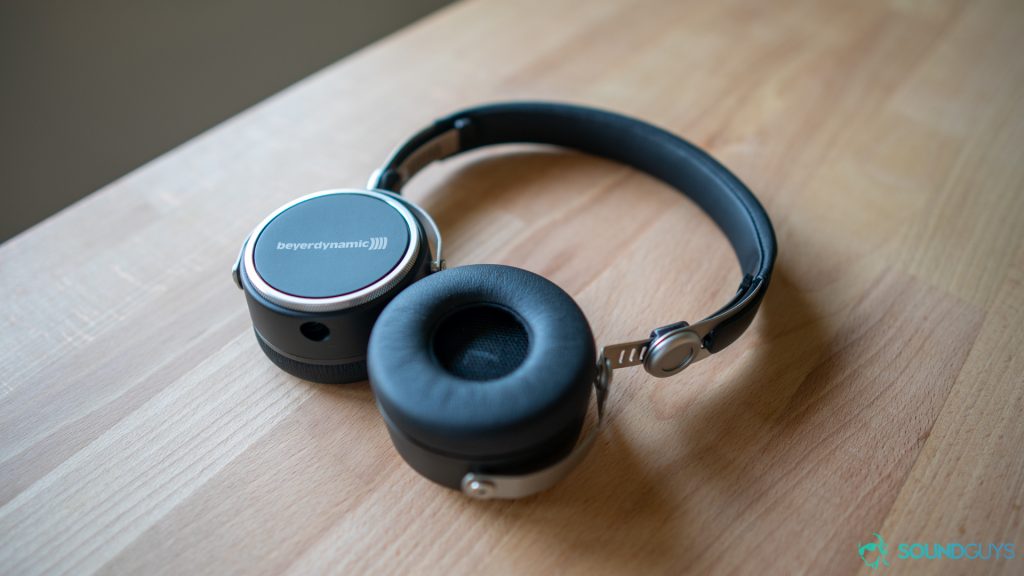 Beyerdynamic Aventho Wired headphones pictured lying flat on a desk. 