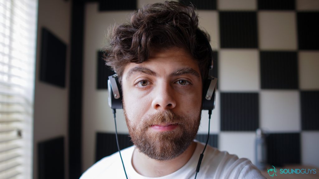 Front view of someone wearing the Beyerdynamic Aventho Wired headphones.