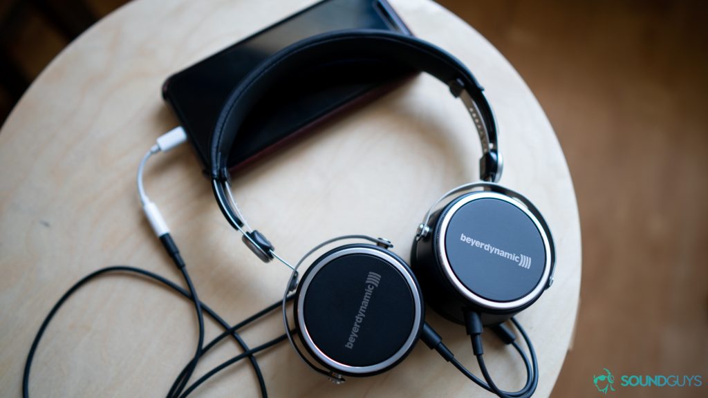Aventho Wired headphones plugged into the dongle of the Apple iPhone X. 