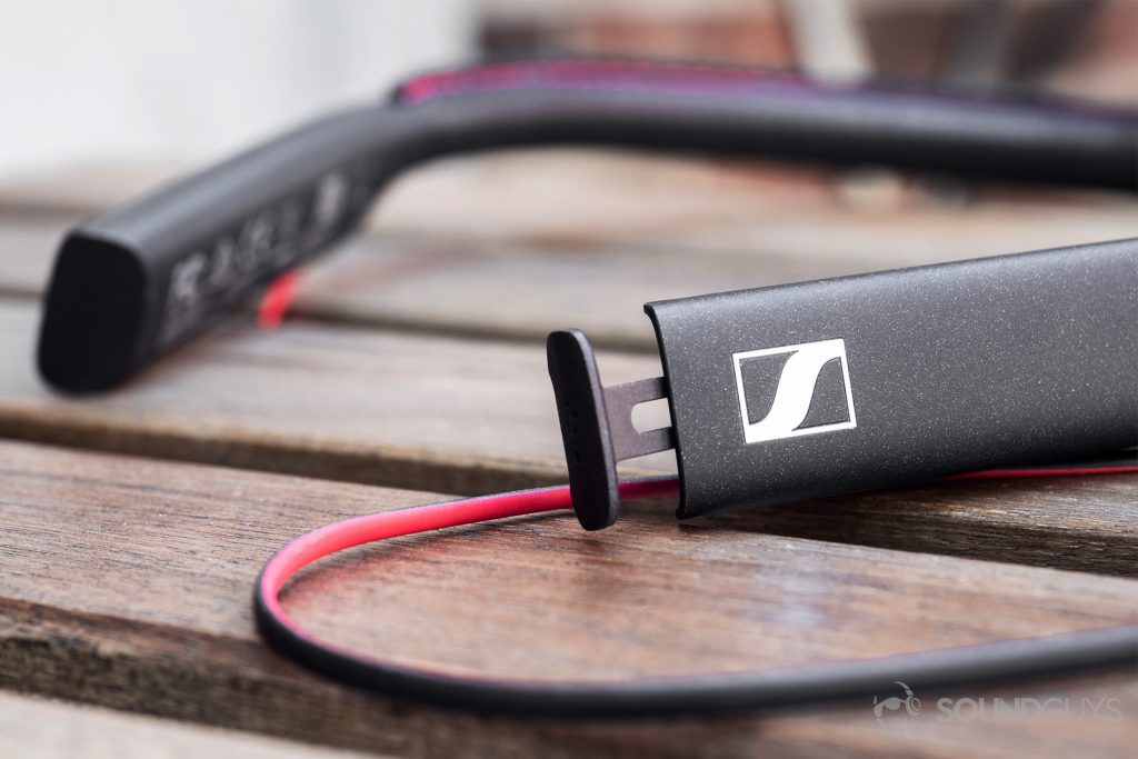 Sennheiser HD1 In-Ear Wireless: An image of the headphones resting on a wooden, slatted chair.