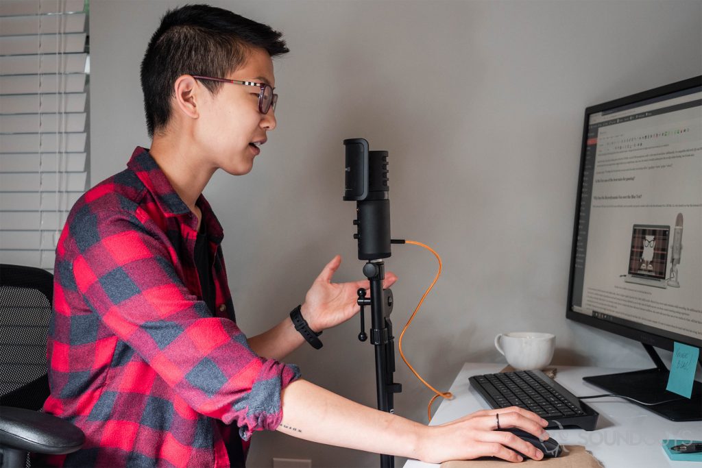 Beyerdynamic Fox USB microphone: Lily using the microphone at her desk. It is connected to a mic stand via the included adapter.