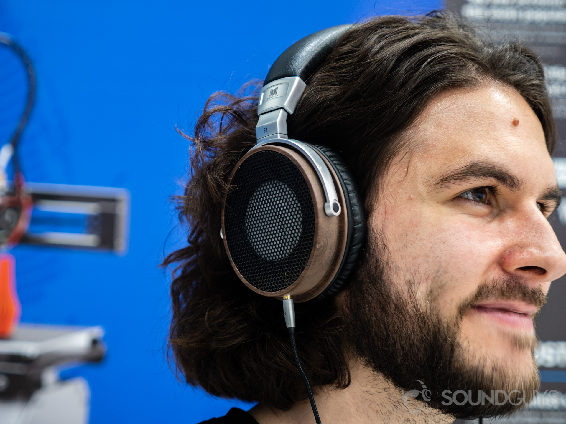 Monoprice-M650-IFA-2018-SoundGuys-1 A man wearing the Monoprice Monolith M650 headphones at IFA 2018.