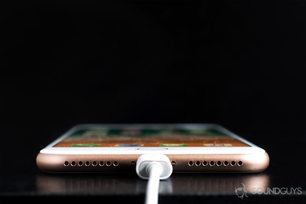 Sennheiser Ambeo Headset: Straight-on shot of the headset plugged into an iPhone 8 Plus.