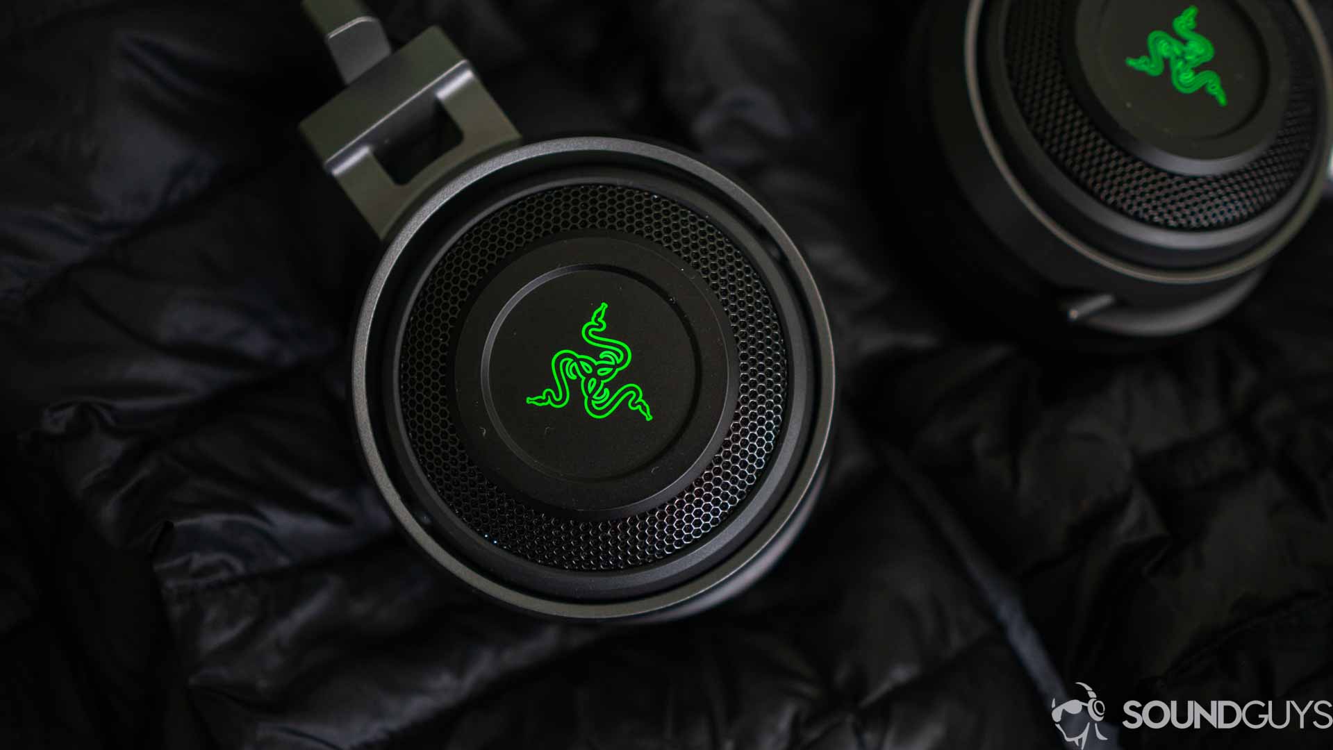 A picture of the glowing logo of the Razer Nari Ultimate
