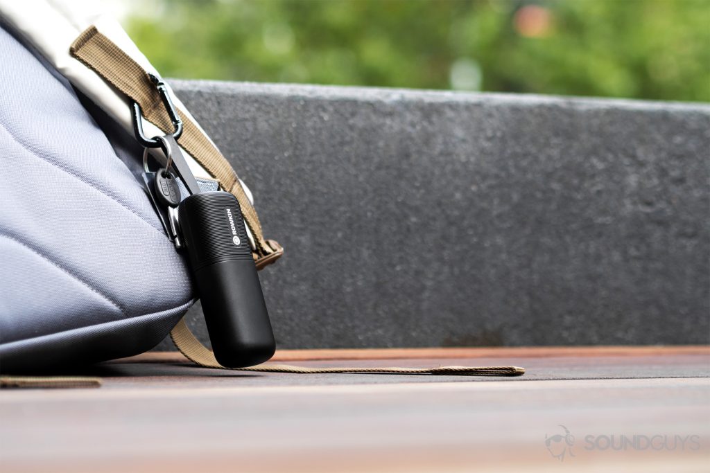 Rowkin Ascent Charge+ review: The charging case attached to a backback via a carabiner running through the loop.