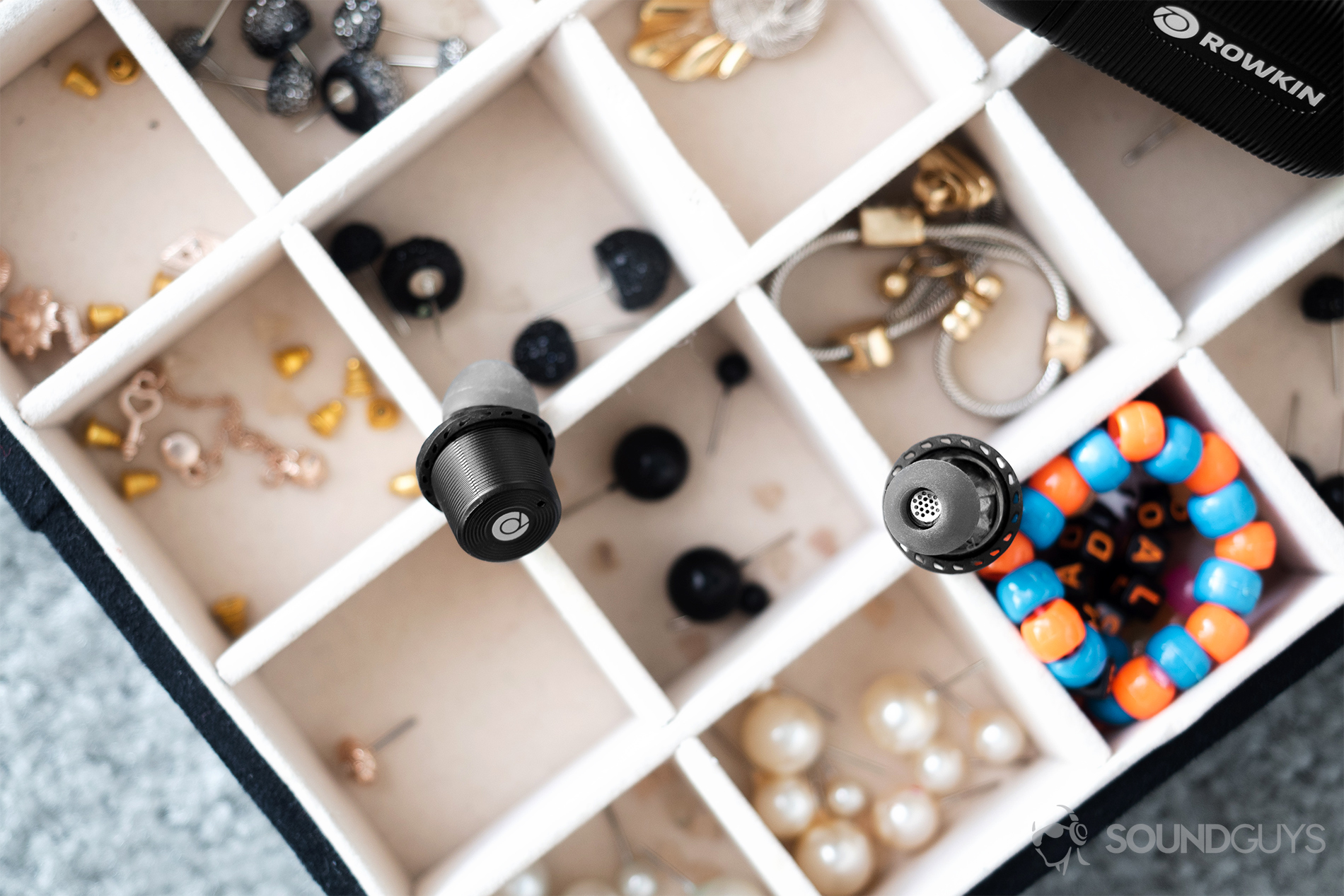 Rowkin Ascent Micro: A top-down image of the earbuds on top of an open jewelery case.