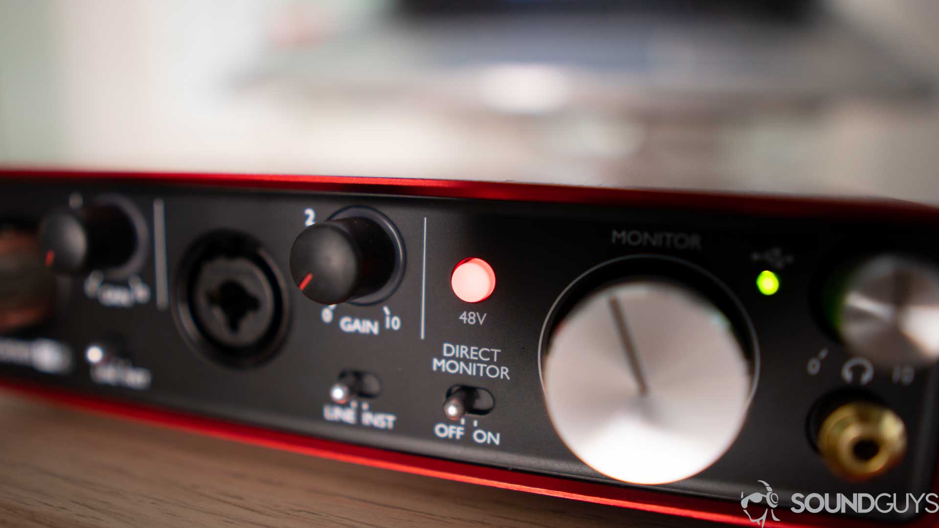 A picture of the phantom power button on the Scarlett 2i2 USB interface, which is an affordable home studio recording interface.