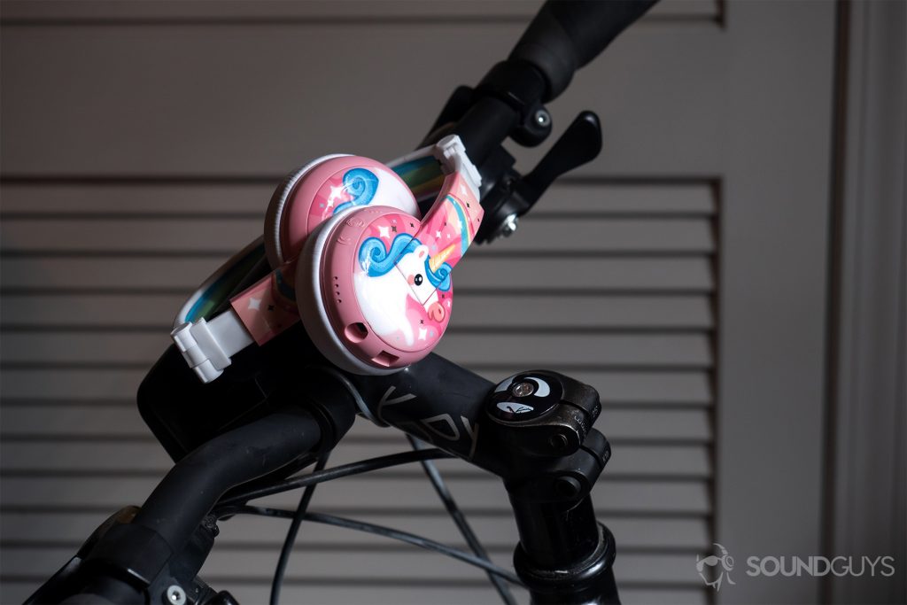 Buddyphones Wave: The headphones folded and resting on bike handlebars.